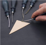 修边器用于手工皮革的基础是裁剪和缝合_修边器