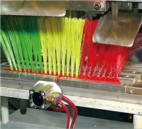 Three color broom machine fixture