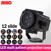Hot sale waterproof 12 kinds of pattern LED projection light customizable pattern lawn lamp Christma